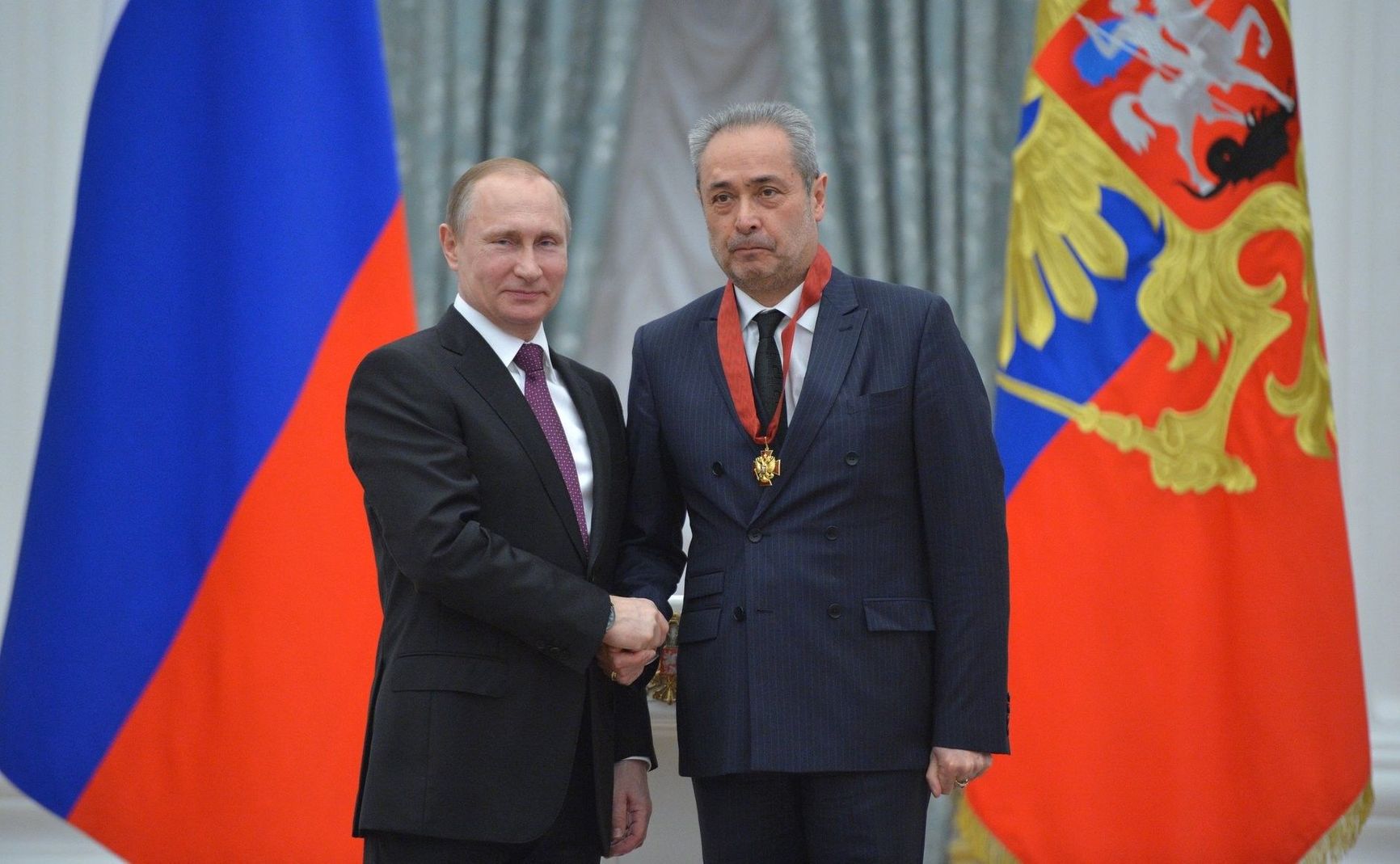 Film director Valery Fokin receiving a state award from Vladimir Putin.